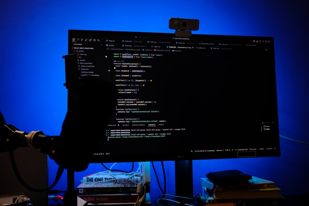 A computer monitor sitting on top of a desk